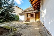 Vilă 5 camere, teren 1.500 mp cu livadă, garaj dublu
